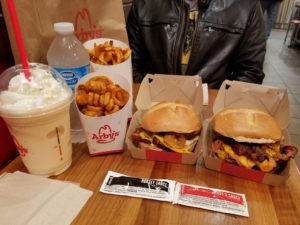 Orange cream shake, water, curly fries, Smoke House Pork Belly sandwich & Smoke Mountain sandwich.